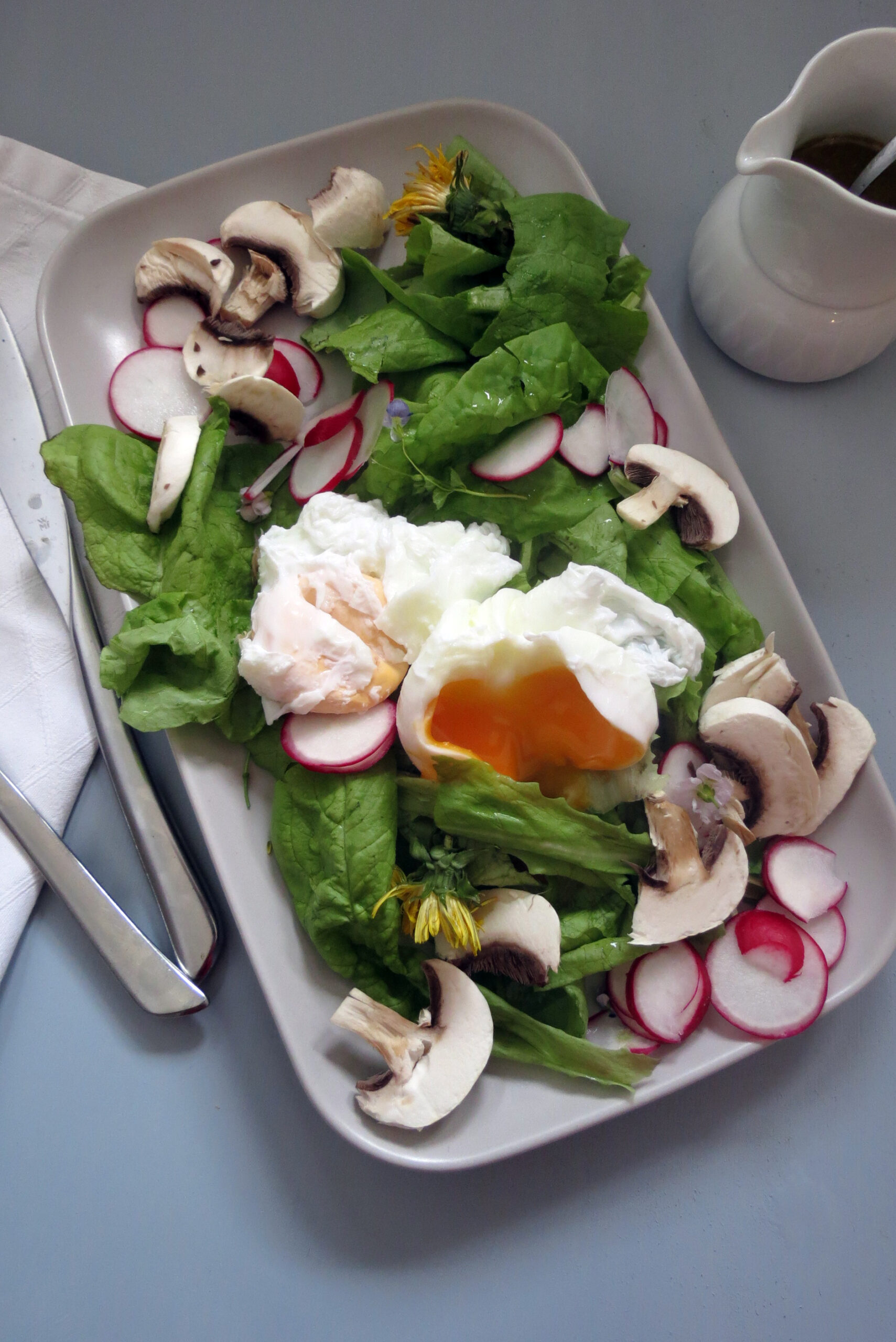spring salad with poached egg
