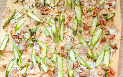 Tarte flambée with asparagus and walnuts