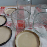 Sterilised jars on a kitchen towel