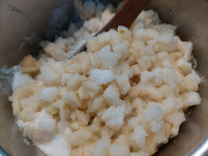 Ingredients for pear jam in a pot