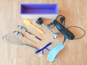 Soap making equipment with soap mould, blender, whisk, thermometers, spatula, safety goggles and face mask