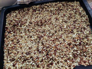Shredded chestnuts on a baking tray, ready to be dehydrated