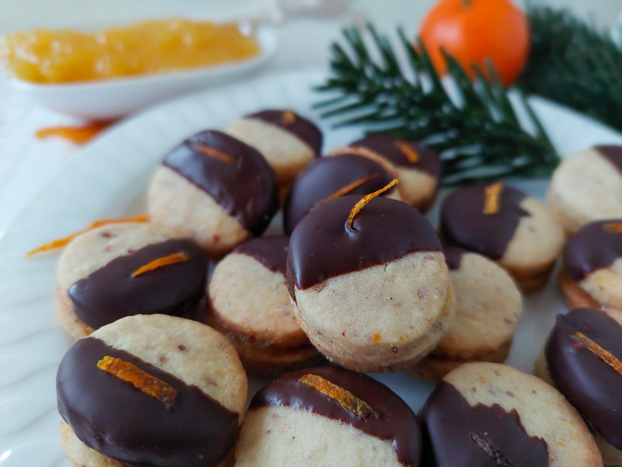 orange Christmas cookies on a plate