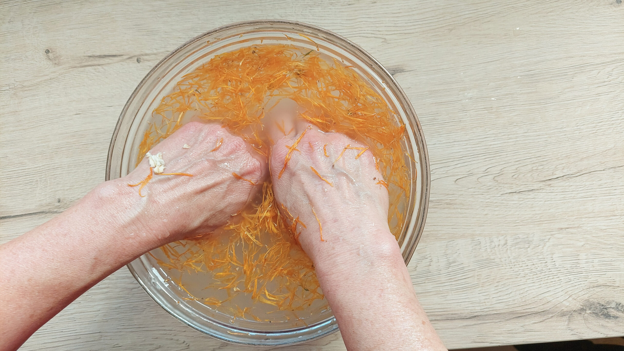 Hand soak with calendula and oats to soothe tired gardener hands