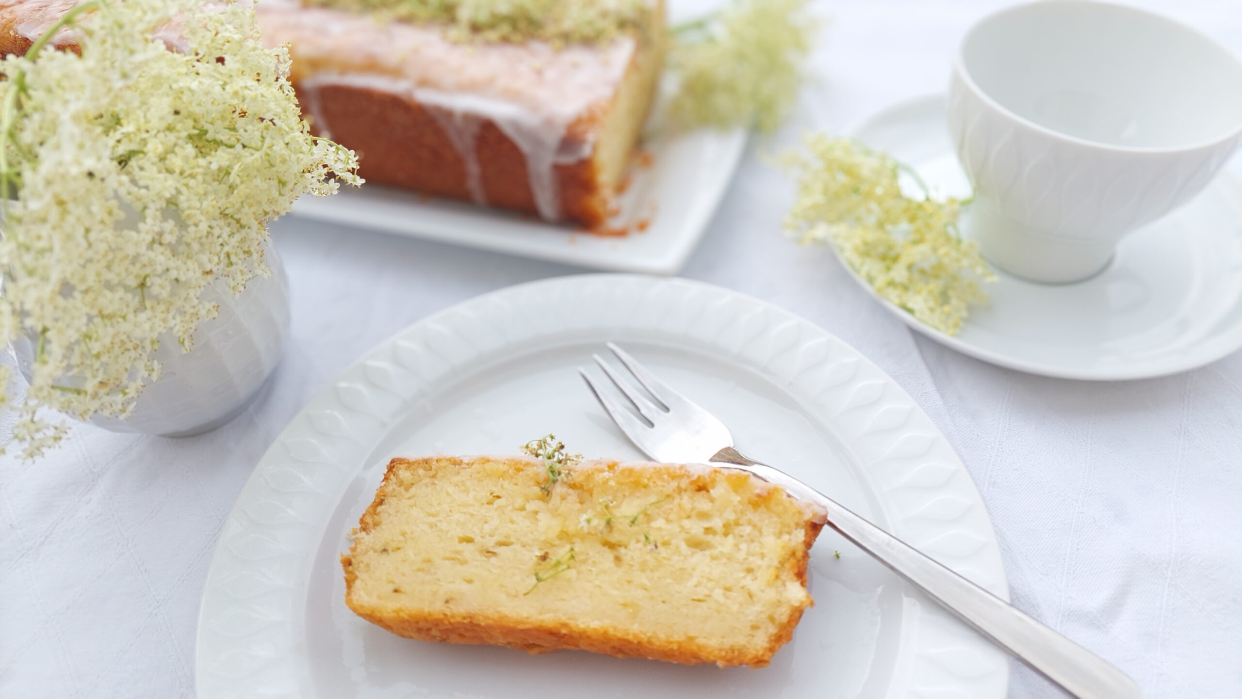 Coffee table with elderflower cake