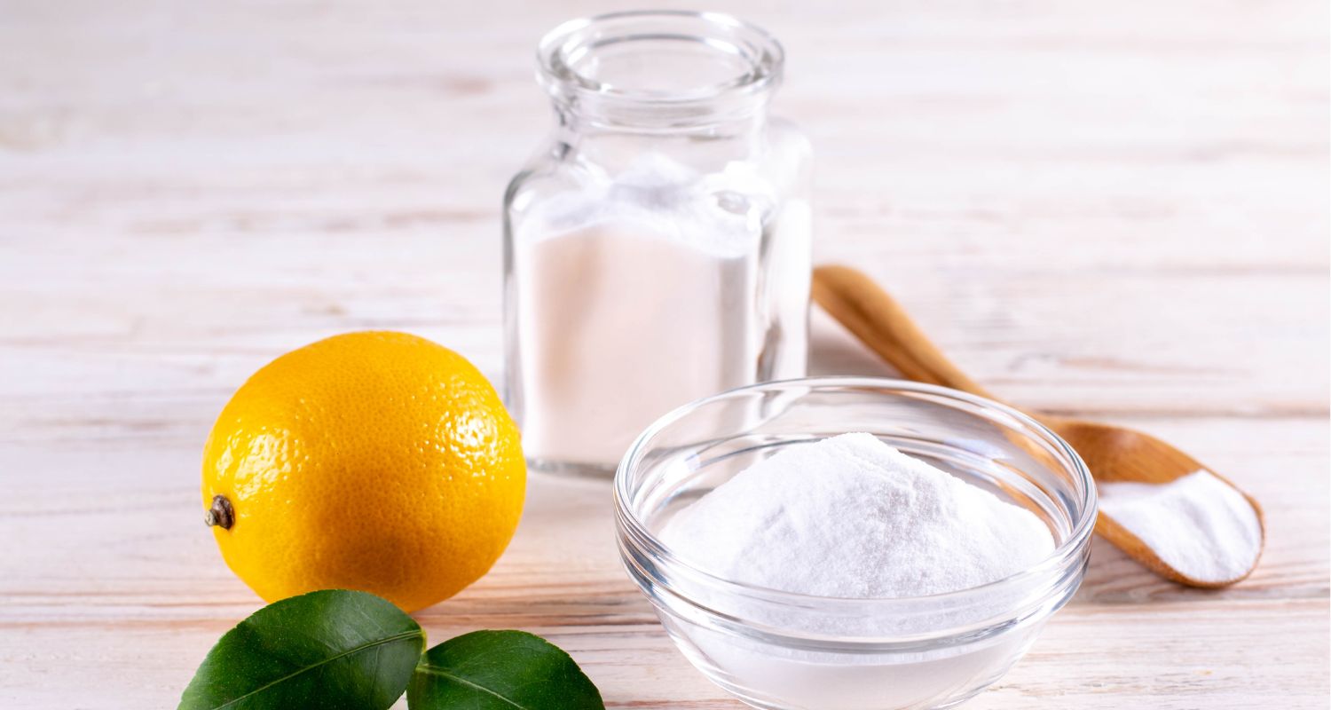 Cleaning Soda, lemon, salt in a jar as basic ingredients for homemade cleaning products